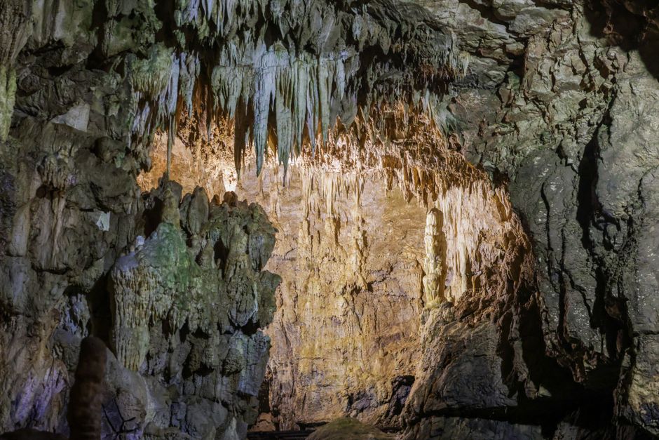 Sandalić Cave Biševo interior limestone walls boat