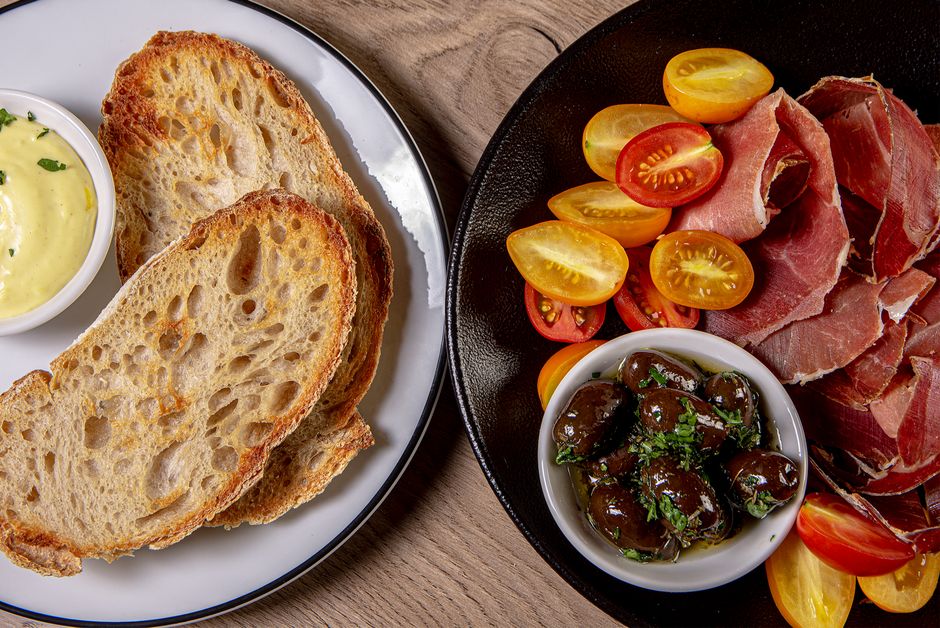 Pag Island Croatia prsut cured ham plate with olives and bread
