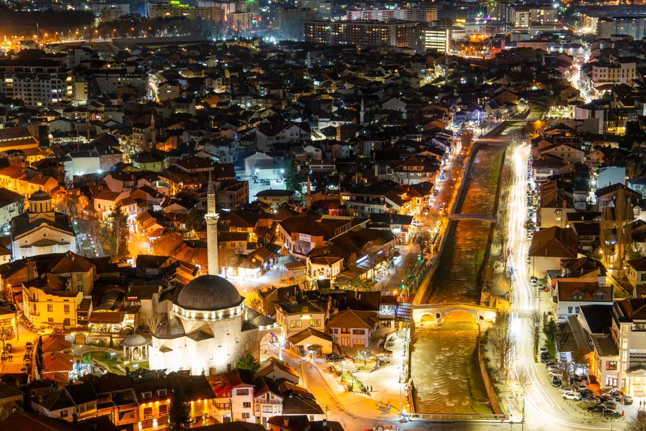 Prizren Bistrica River night lights reflection