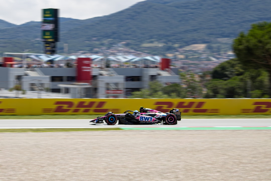 Formula 2 cars racing tight corner Barcelona circuit