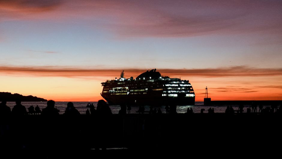 Patmos ferry arriving at Skala port sunset