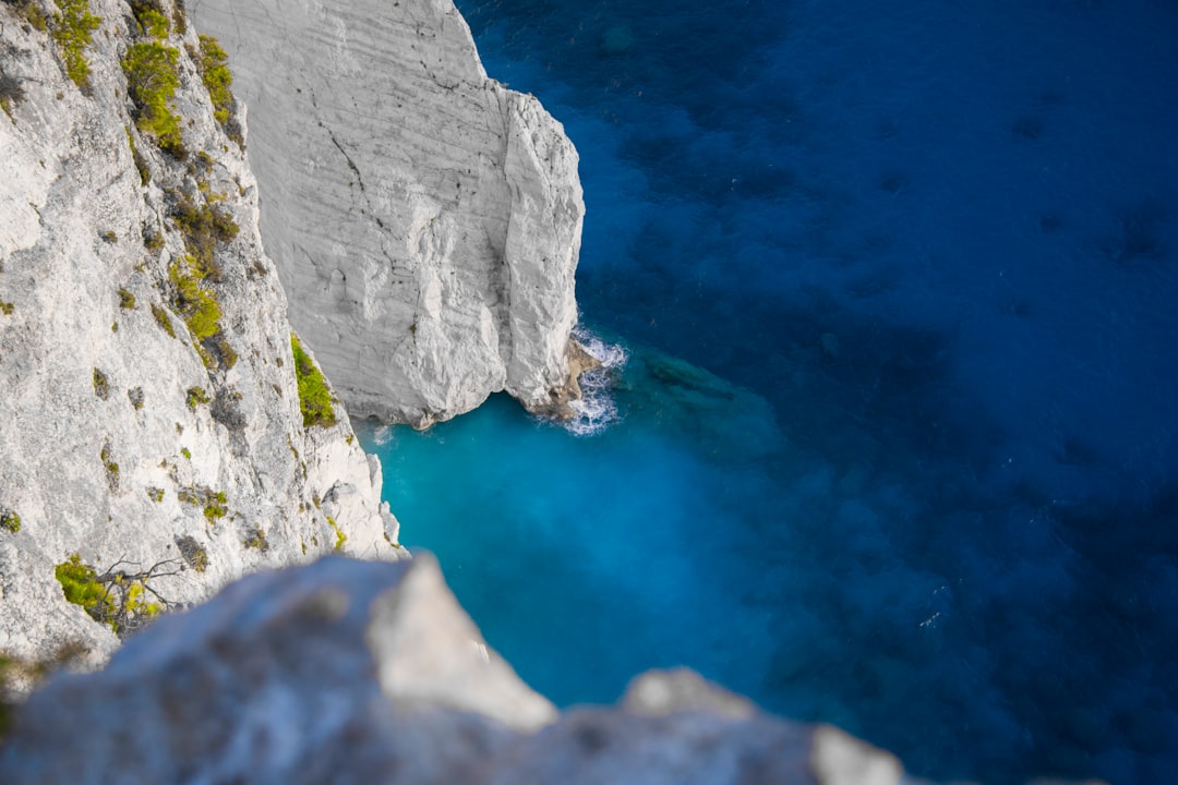 Blue Caves Zakynthos Greece sunlight water reflection boat