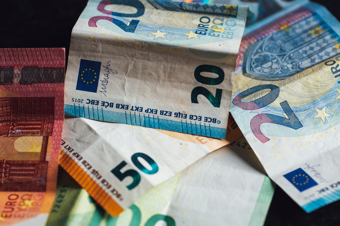 Euro banknotes and coins display close up