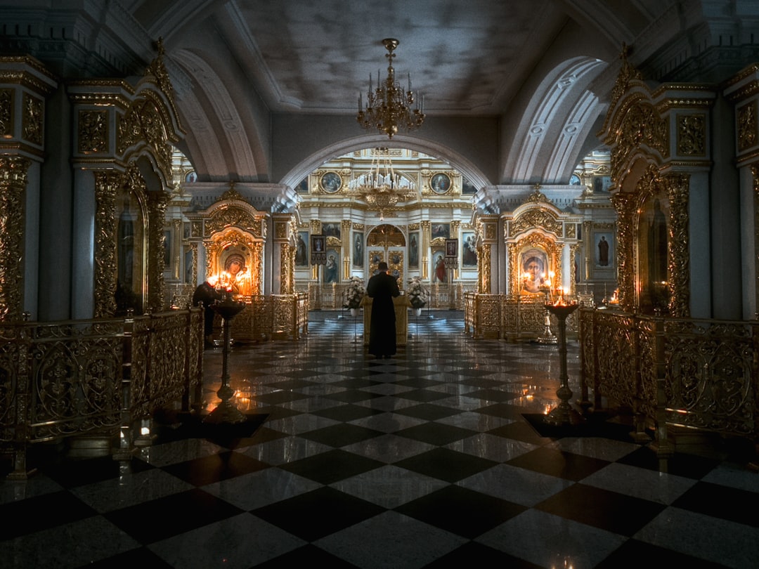 Rila Monastery Main Church interior gold iconostasis candles