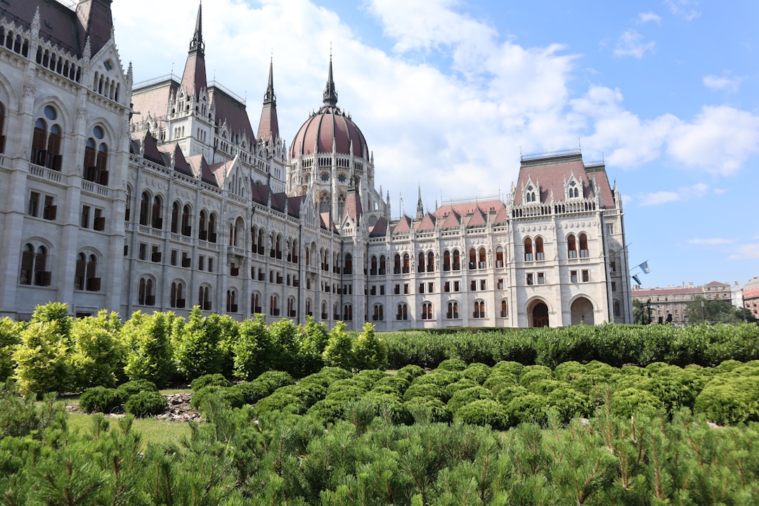 EU flag waving in front of Hungarian Parliament building