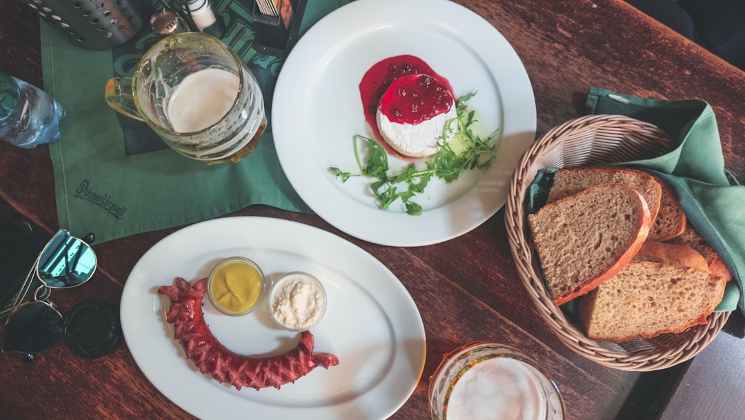Prague street food klobasa grilled sausage mustard bread