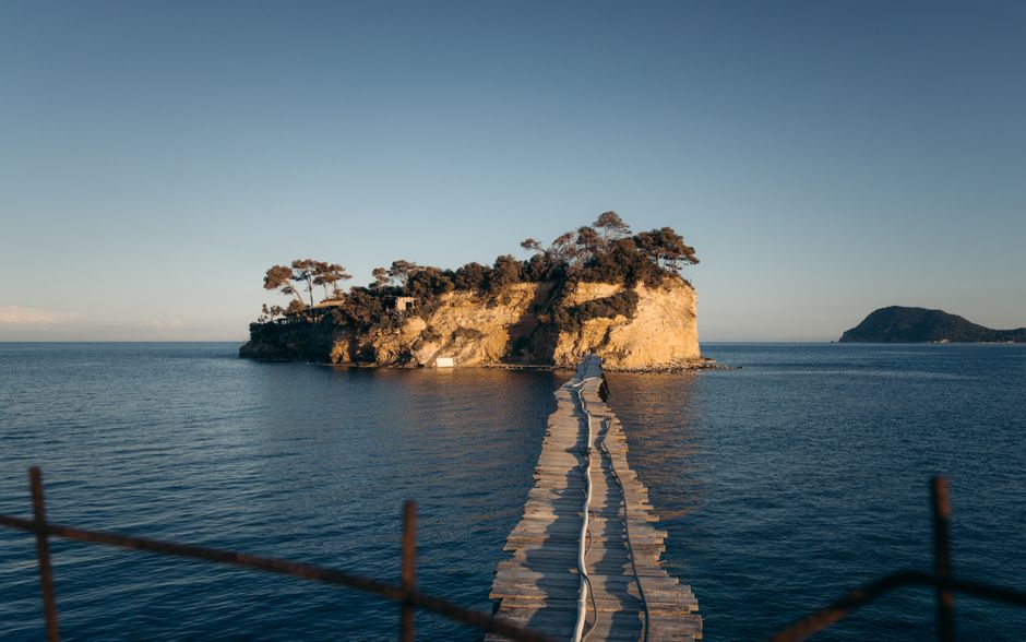 Pylos Castle Greece sunset reflection deep blue water