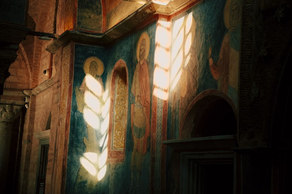Studenica Monastery nave interior frescoes upward angle light beams