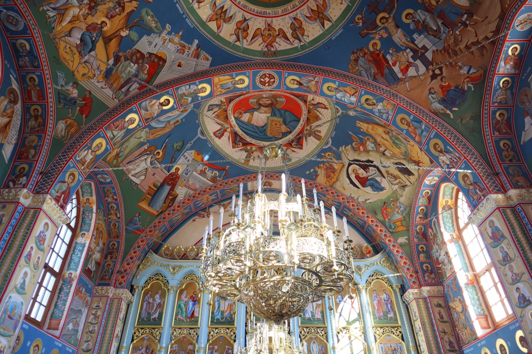 Moldovita Romania painted church exterior Tree of Life frescoes vibrant