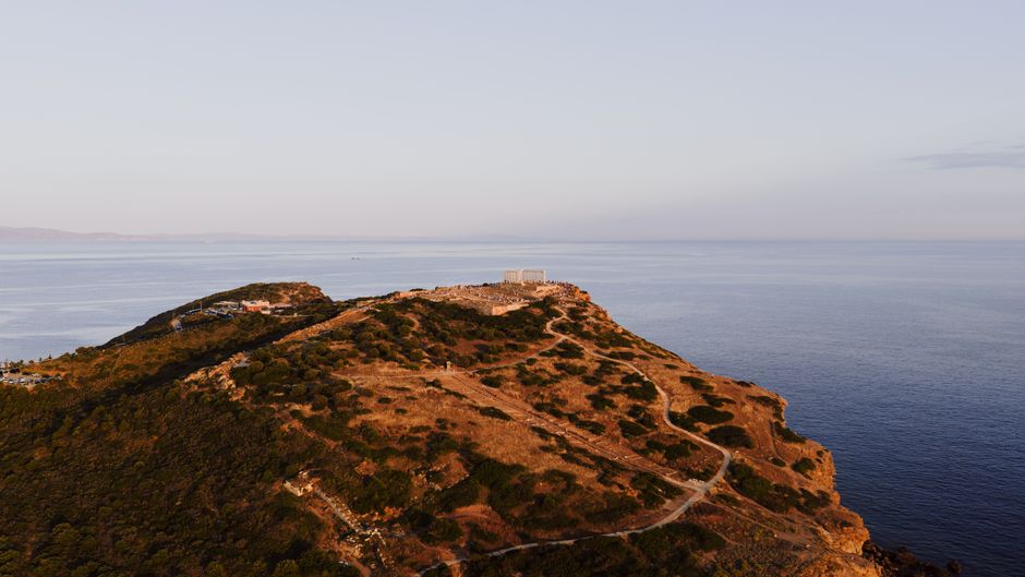 Mani Peninsula Greece stone towers sunset cliffs