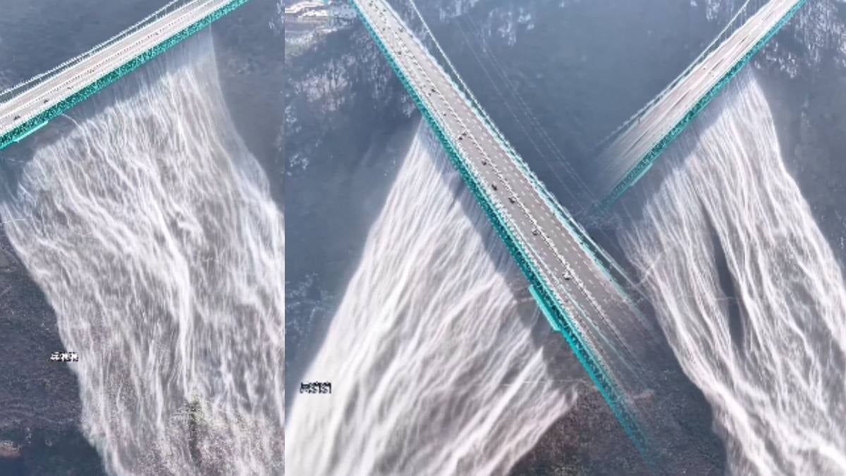 World's Tallest Suspension Bridge: Waterfall Flows Beneath