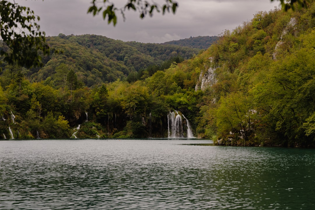 Plitvice Lakes sunset golden hour water reflection Croatia