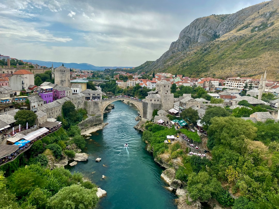 Mostar city walls stone ramparts view over Stari Most