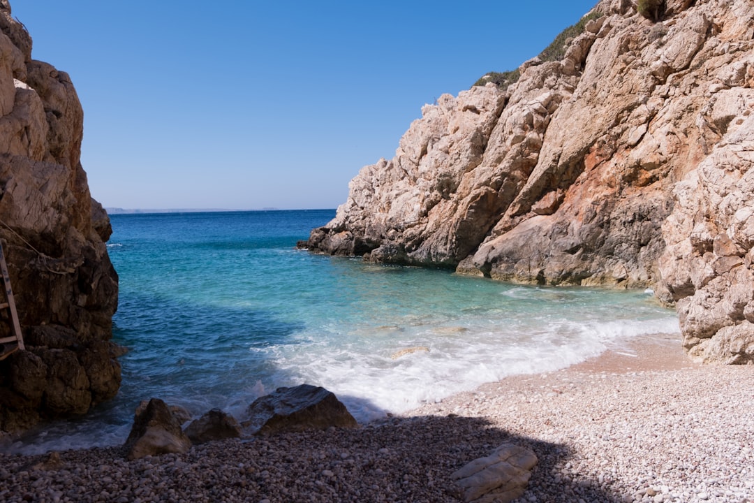 Agia Paraskevi beach Limnos Greece clear water rocky outcrop