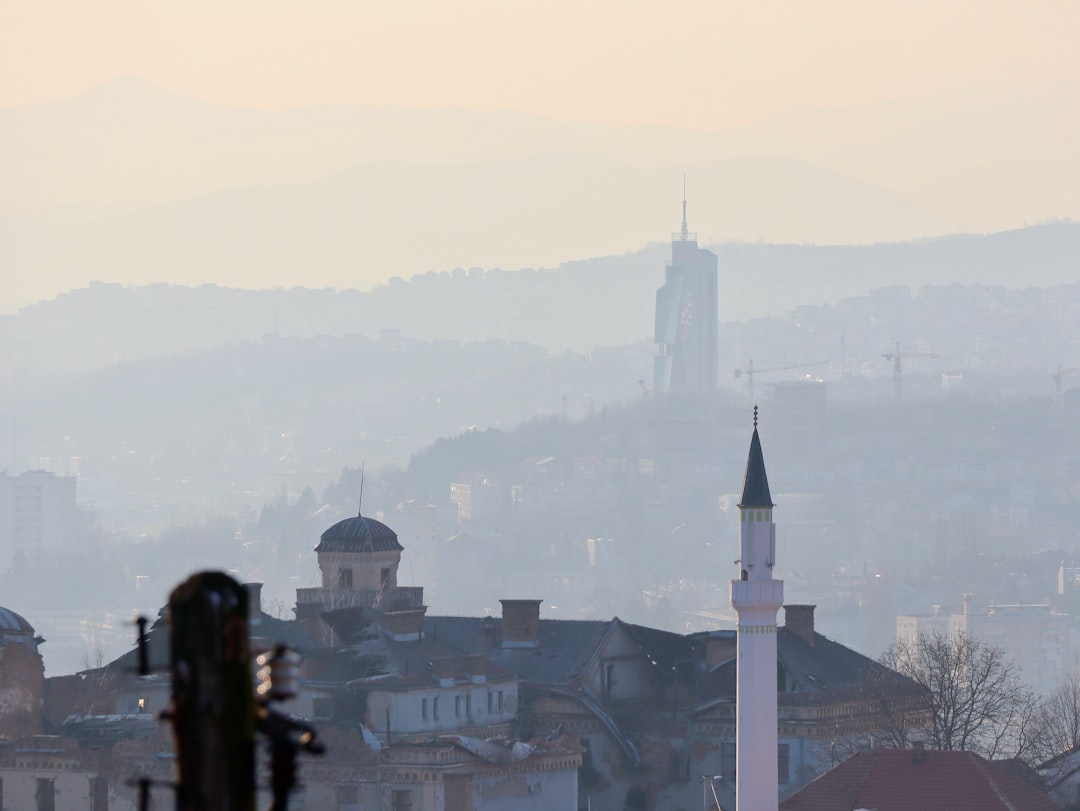 Sebilj Fountain Sarajevo stone octagonal water pigeons morning light