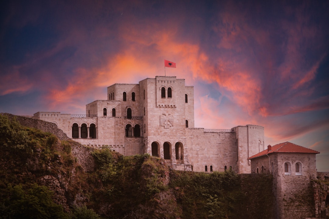 Kruja Castle Albania view over old bazaar Skanderbeg statue