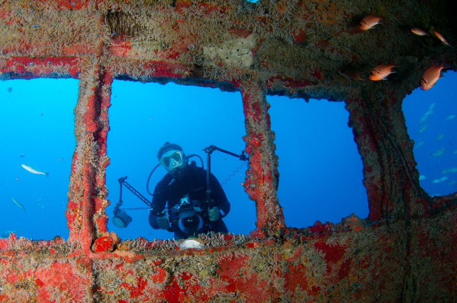 Maestrale wreck Vis Island Croatia diver exploring superstructure blue water