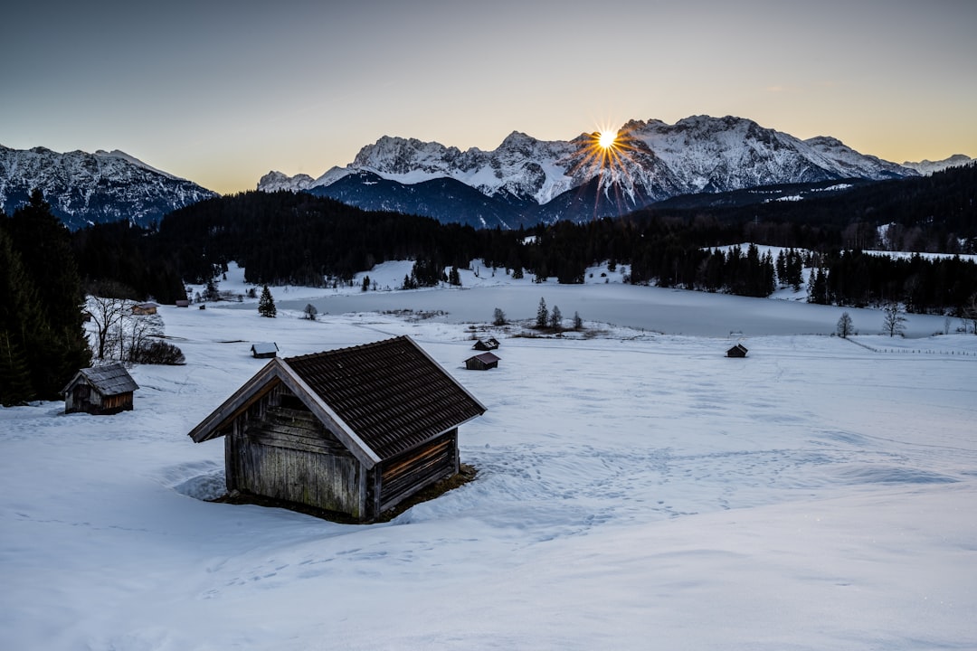 Sutorman Hut Montenegro mountain refuge snow peaks sunset