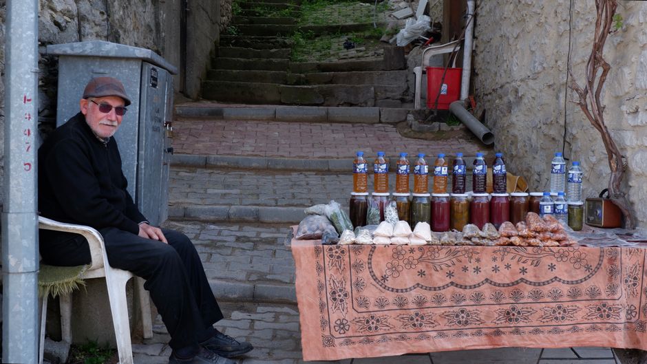 Ohrid Old Bazaar street food stalls rakia bottles