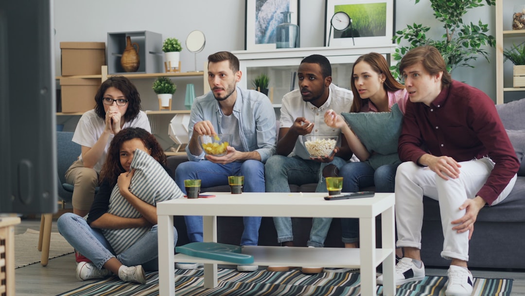 Balkan audience watching TV series living room