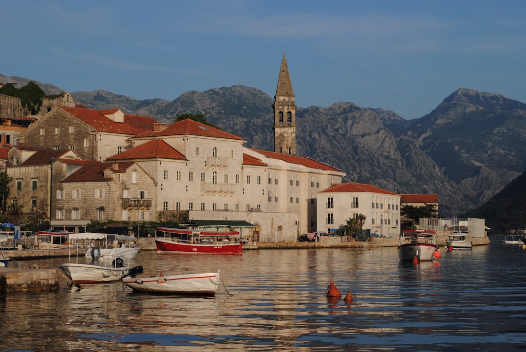 Perast Old Town Montenegro waterfront colorful houses kayak dock