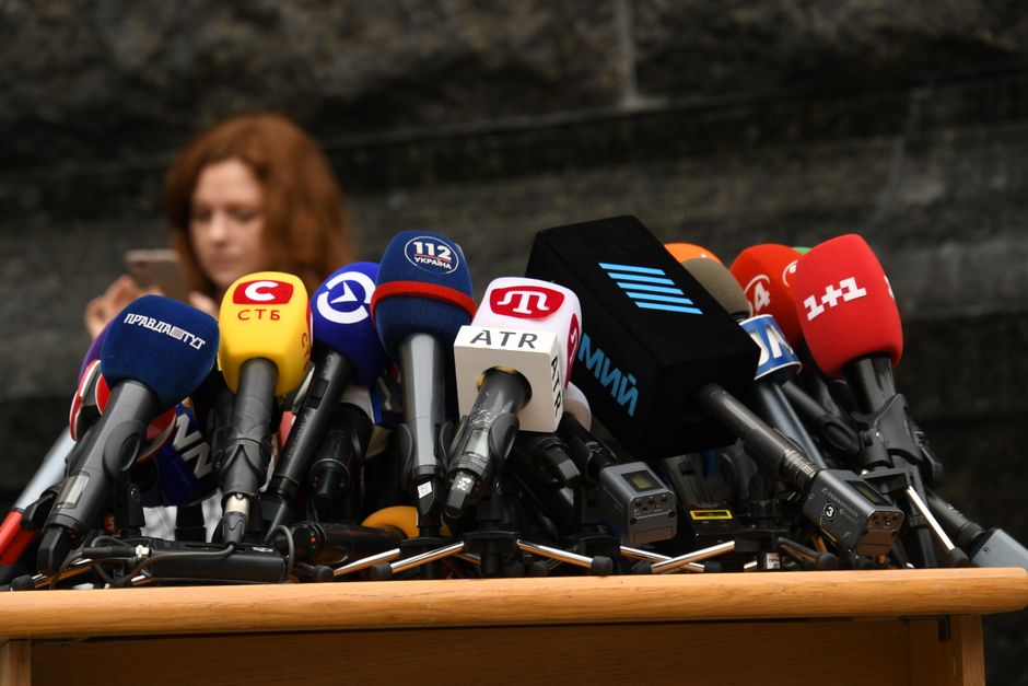 Romanian union leaders speaking at press conference