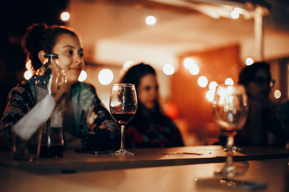 Greek bar Litochoro night atmosphere wine glasses hikers