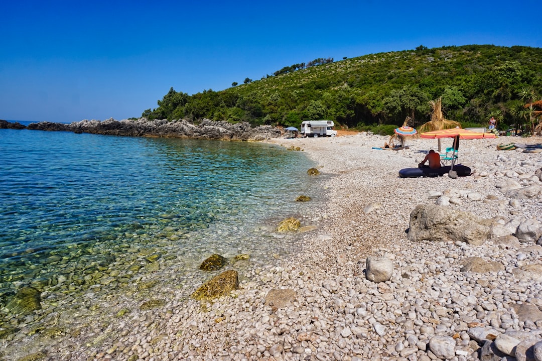 Himara Beach Albania long sand pebbles clear water relaxed