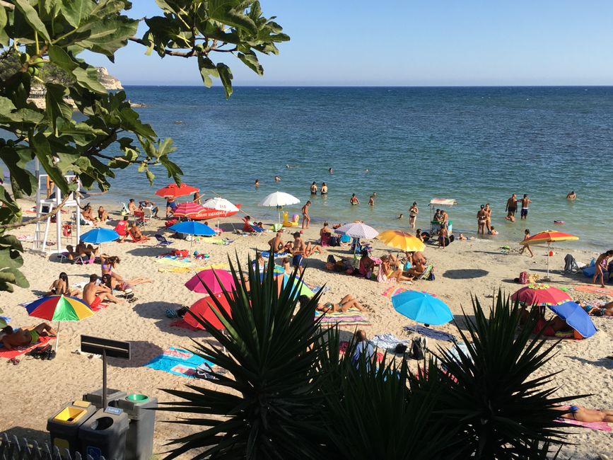 Marina Grande Beach Otranto summer crowds clear water
