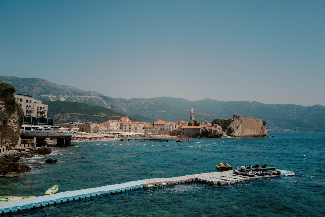 Mogren Beach Montenegro clear water rocky outcrops