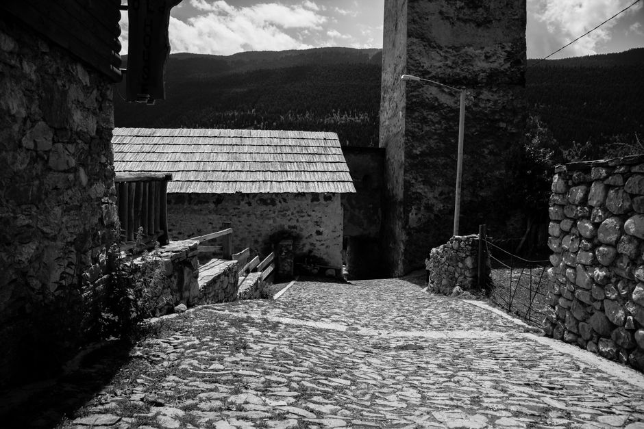 Debarca village stone houses mountain backdrop Pelister National Park
