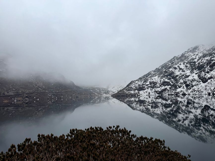 Retezat Mountains limestone peaks glacial lake reflection alpine morning mist