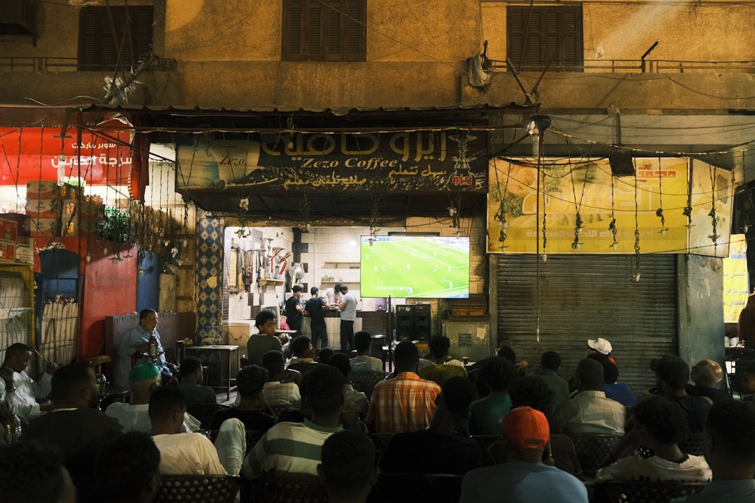 Balkan fans watching football match in cafe