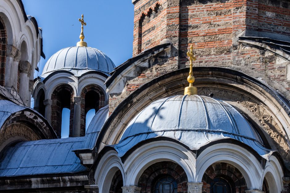 Boyana Church courtyard tomb Vitosha forest background Sofia