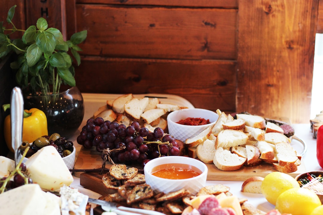 Dalmatian pršut and paški sir cheese platter rustic table olive oil