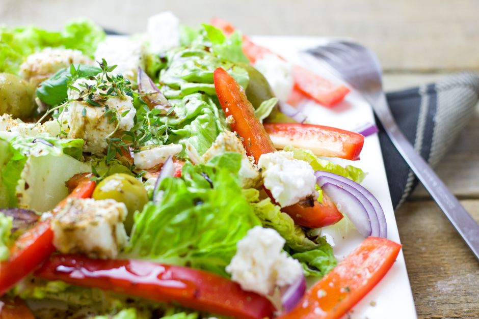Shopska salata fresh vegetables cheese Balkan cuisine plate