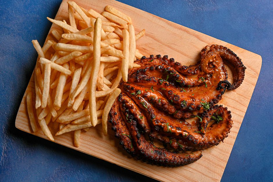 Durres Albania grilled octopus seafood plate lemon