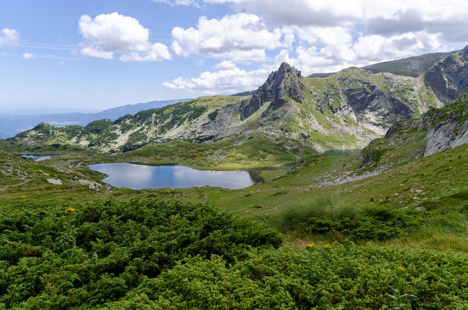 Seven Rila Lakes Bulgaria upper lake turquoise water granite peaks reflection