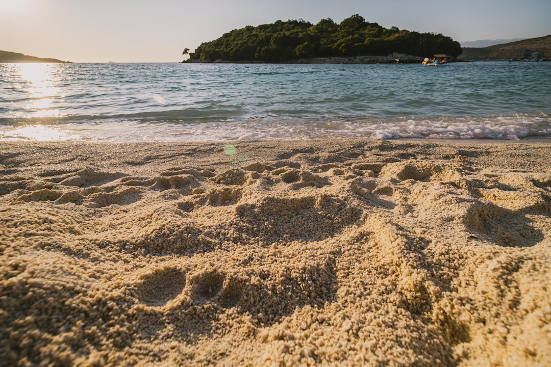 Ksamil Albania turquoise water islands sunset beach