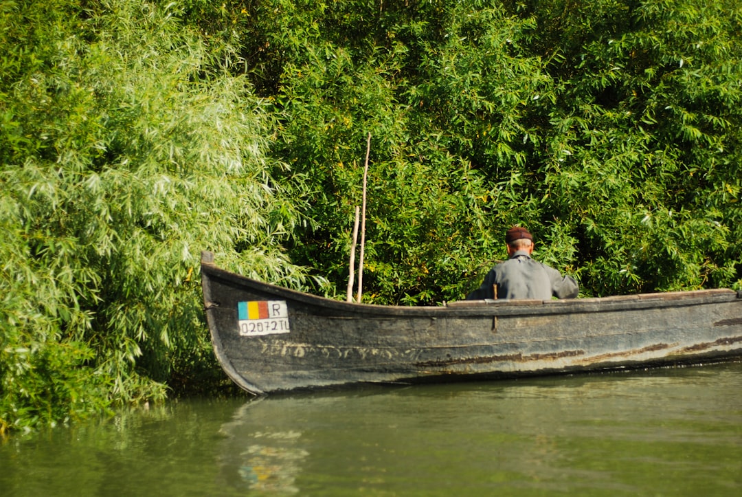 Floating village Danube Delta Romania wooden houses stilts