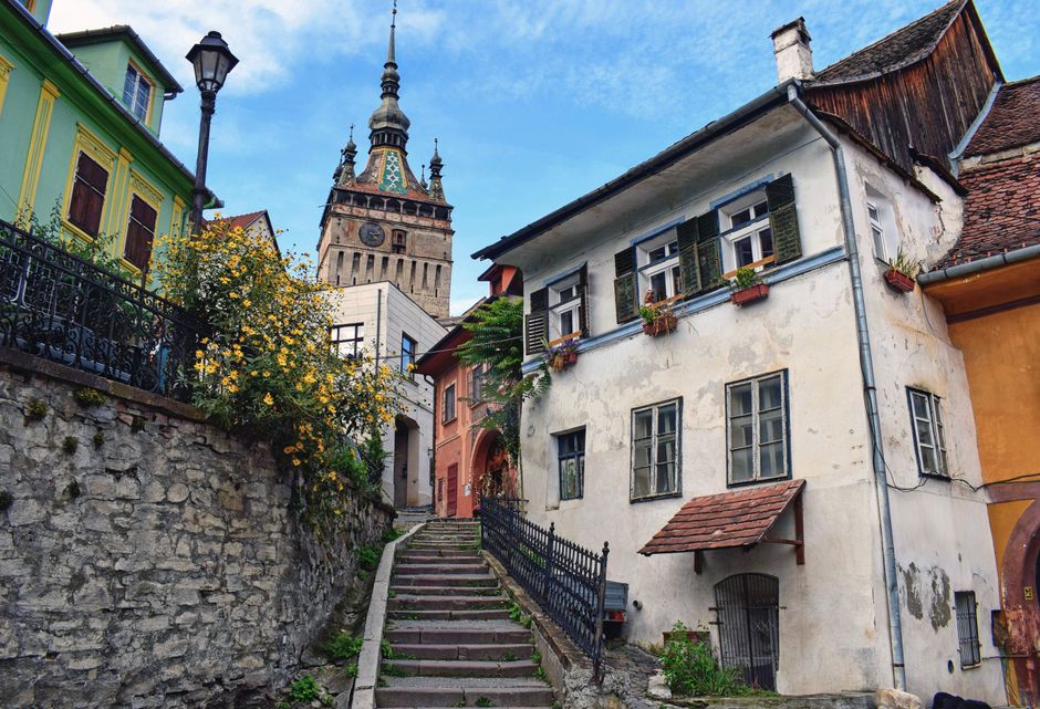 Sighisoara nightlife Calea Cetatii evening street lights