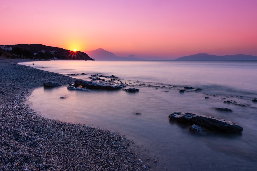 Agios Nikolaos Beach Methoni sunset Greece calm sea