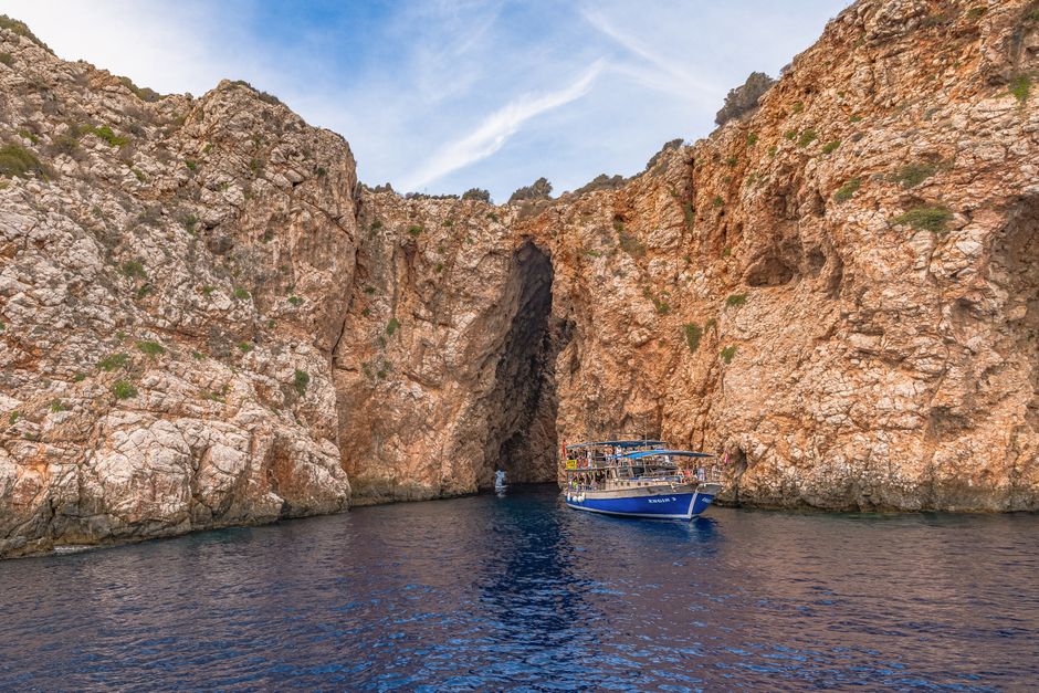 Biševo Blue Cave entrance boat approach Adriatic blue light