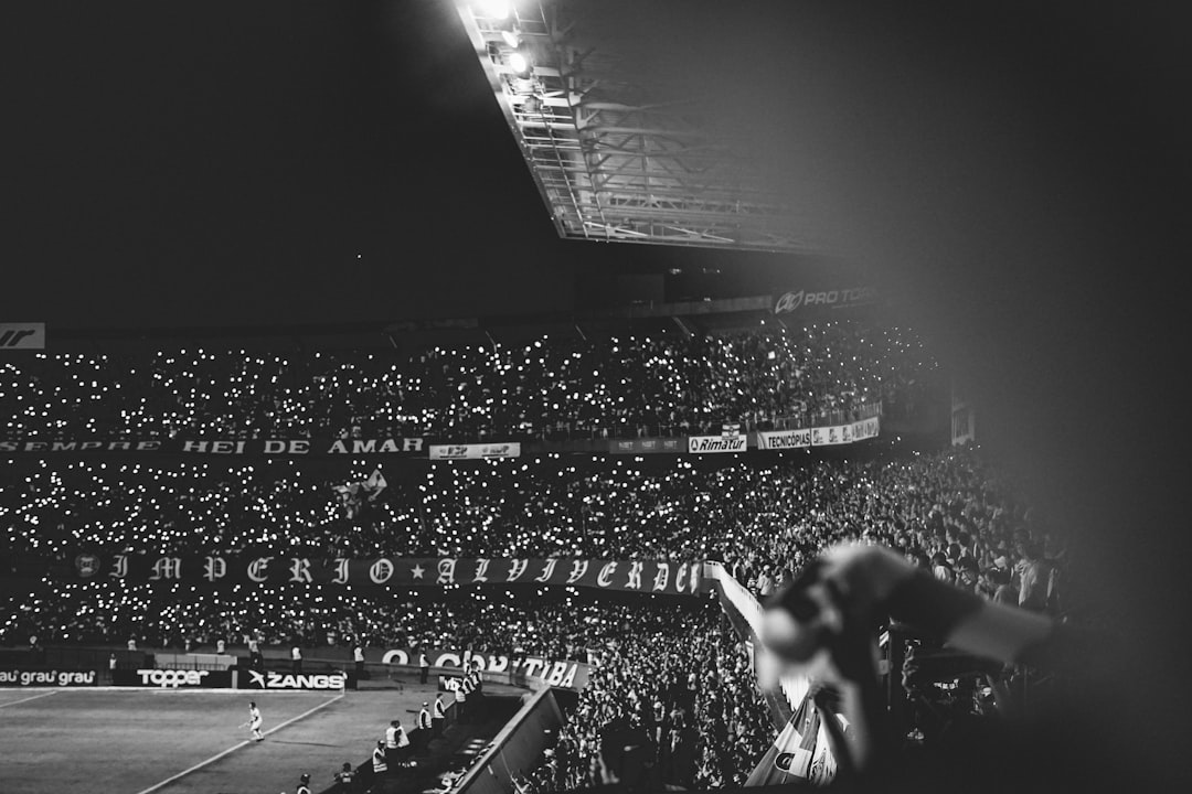 UEFA Champions League match crowd cheering stadium night