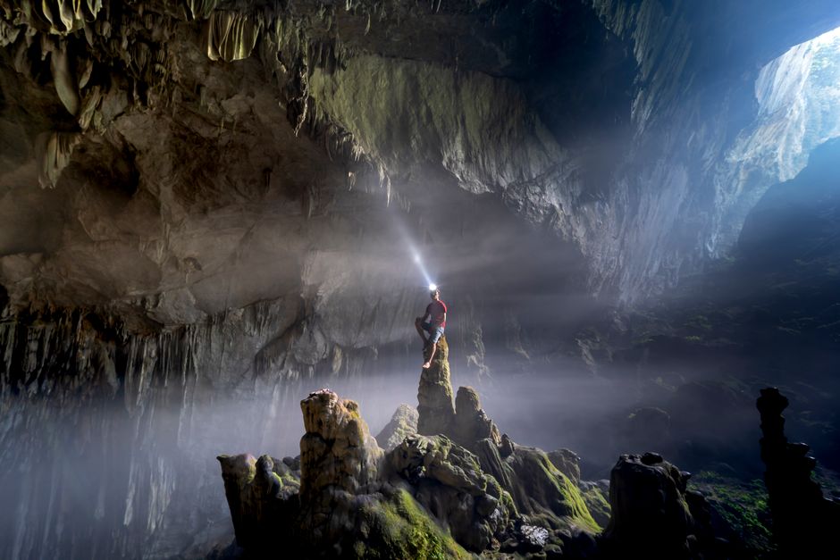 Pasha Cave interior Albania stalactites headlamp beam