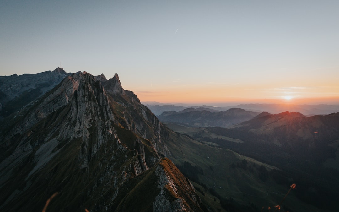 Korab Mountain sunset alpine panorama orange sky rocky summit ridge