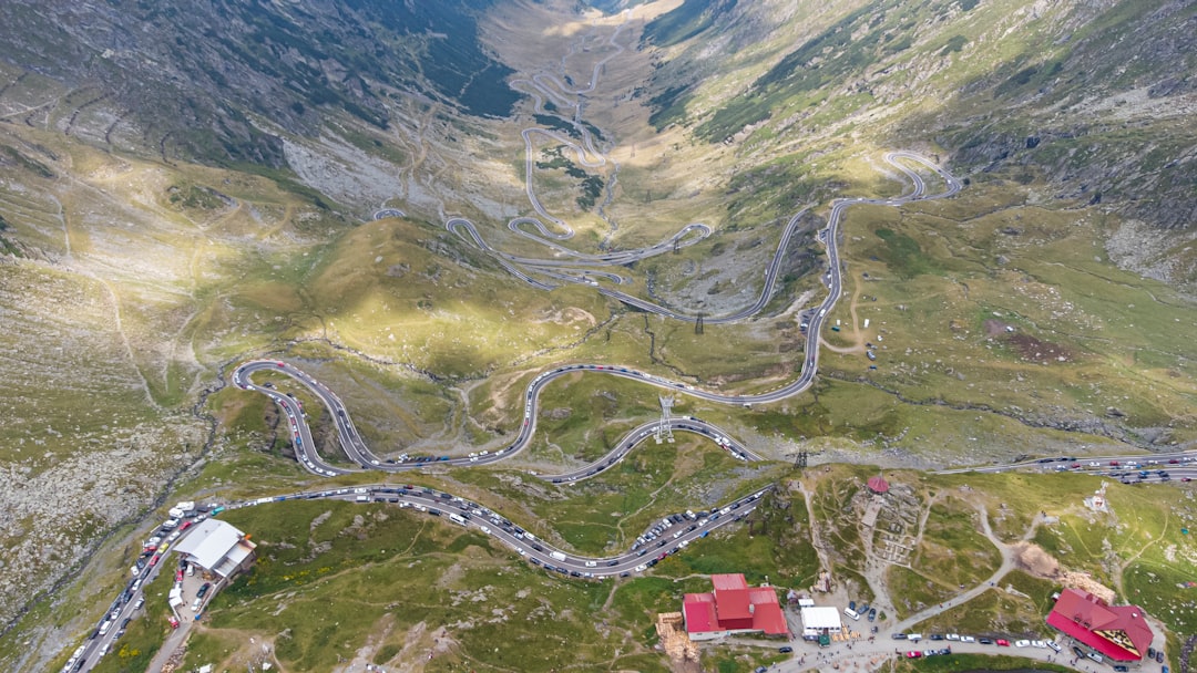 Transfagarasan Highway Romania winding mountain road hairpin turns summer