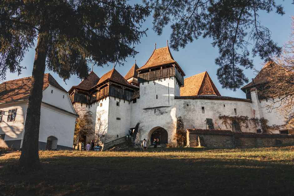 Valea Viilor Fortified Church Romania defensive wall colorful village houses