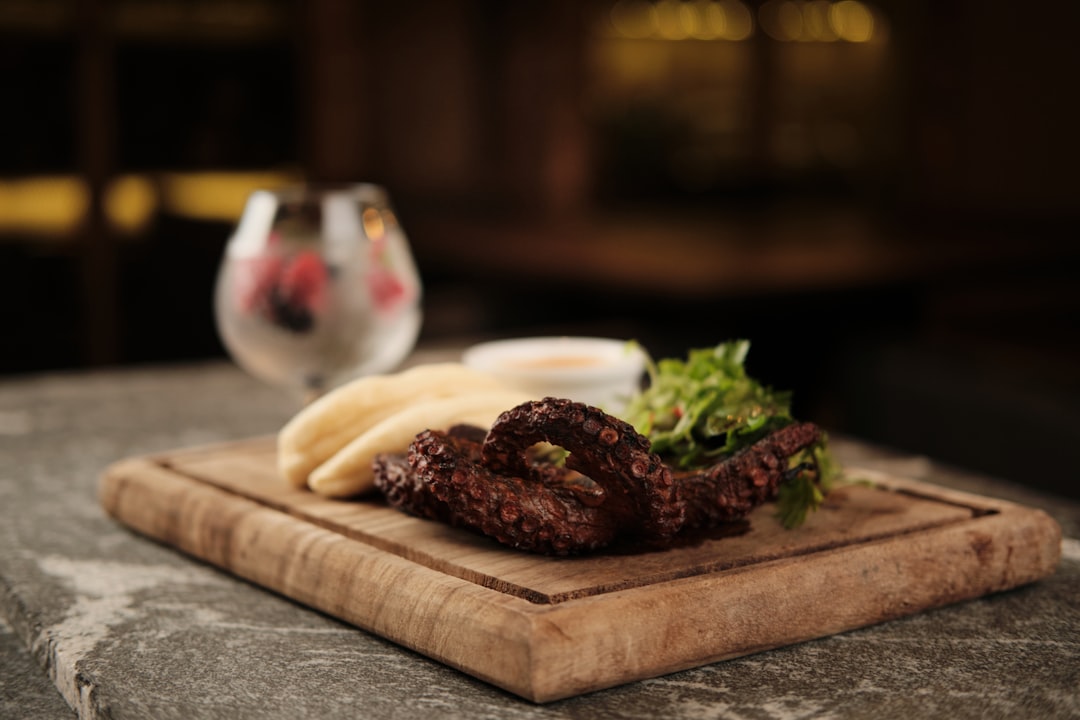 Bosnian cevapi grilled meat sausages with flatbread and onions