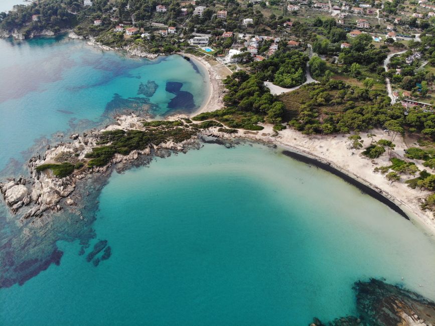 Bay of Kallithea Chalkidiki Greece pine forest beach rugged coast hiking trail